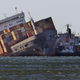 A photo of a container ship sinking off the coast of the UK.